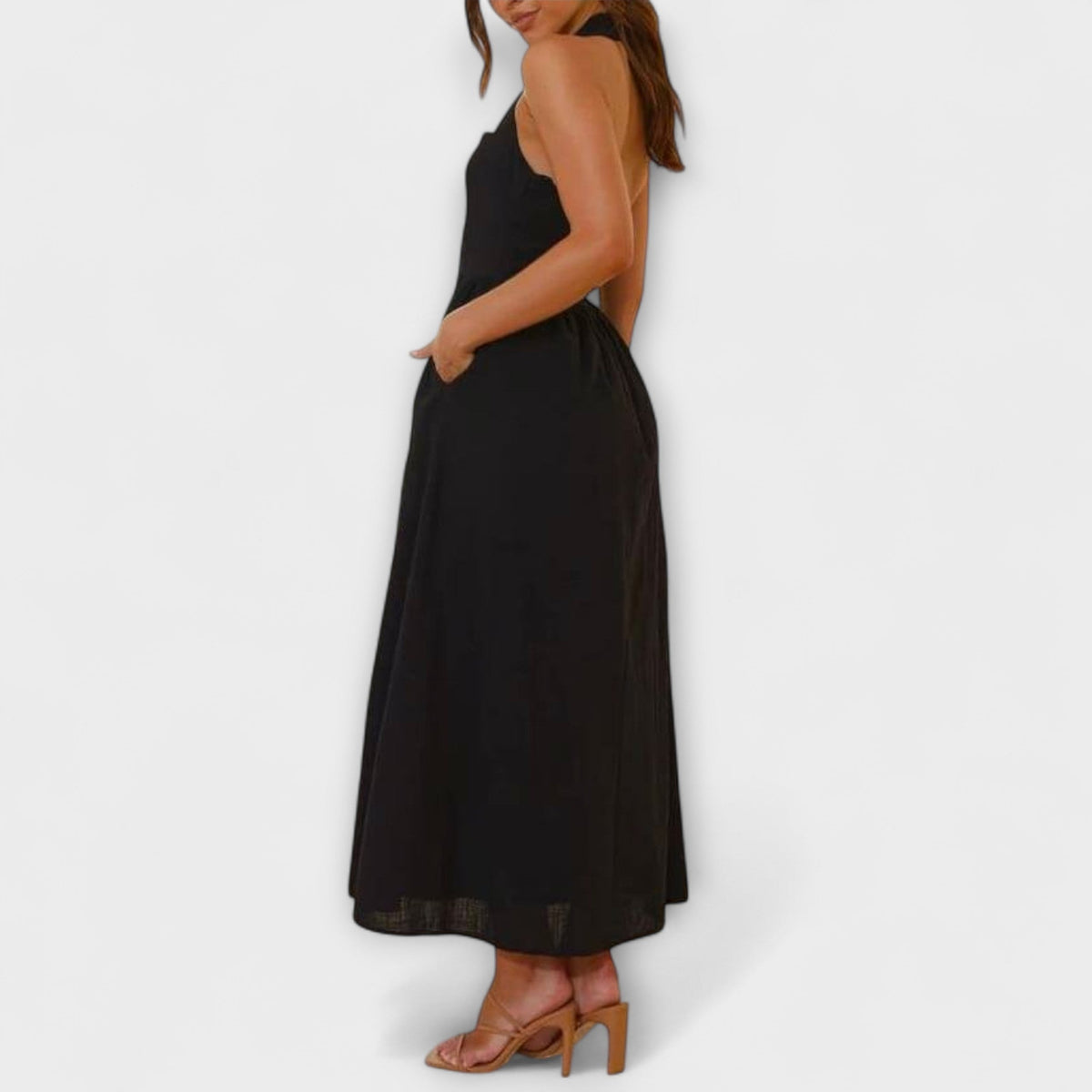 Lydia - Halter jurk van halve lengte met detail in de taille