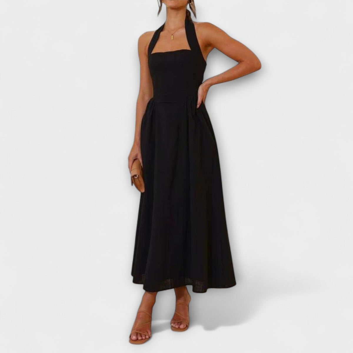 Lydia - Halter jurk van halve lengte met detail in de taille