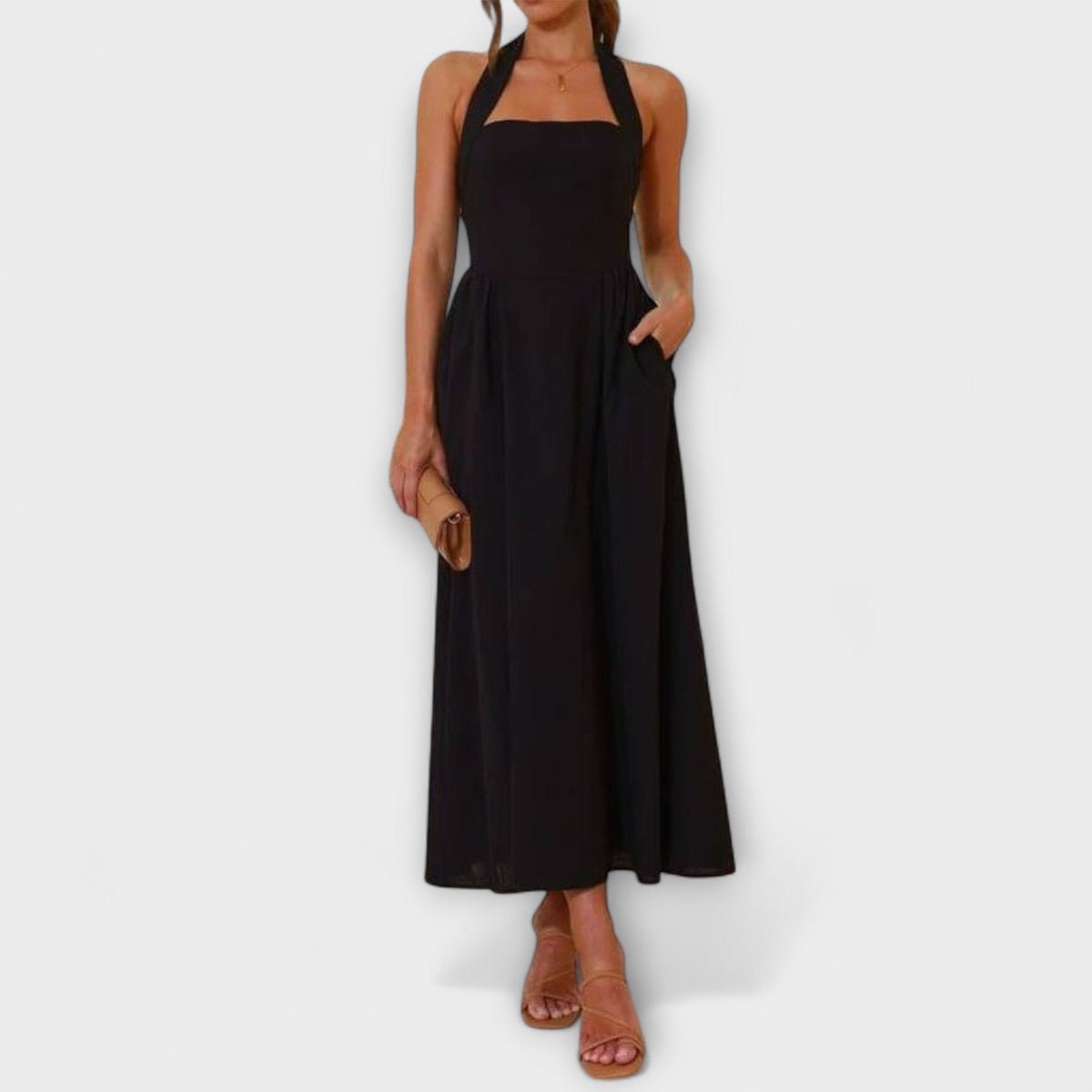 Lydia - Halter jurk van halve lengte met detail in de taille