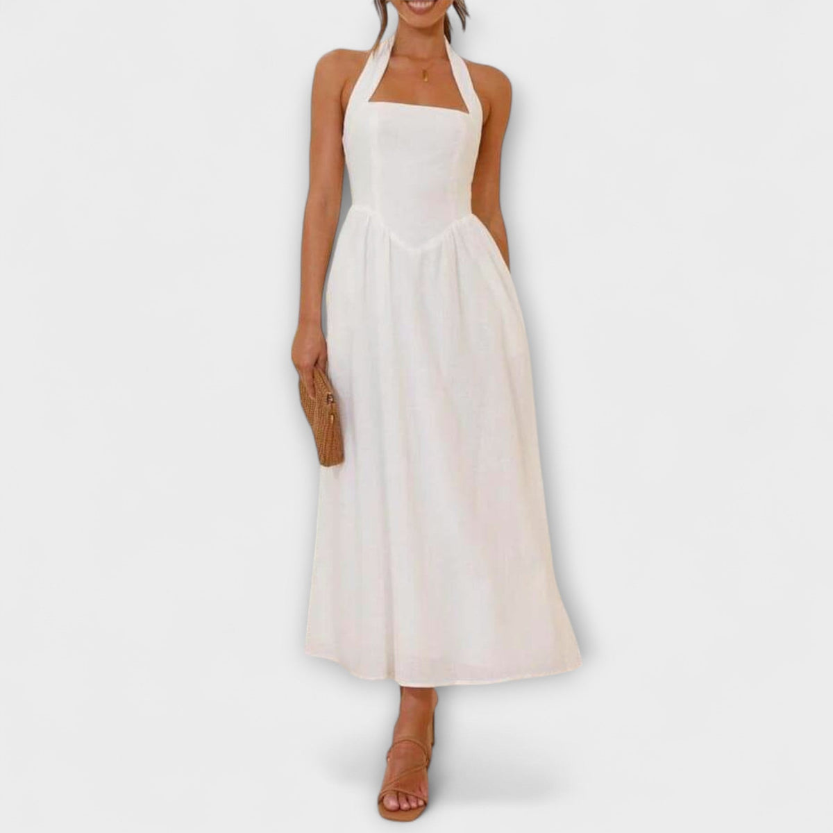 Lydia - Halter jurk van halve lengte met detail in de taille