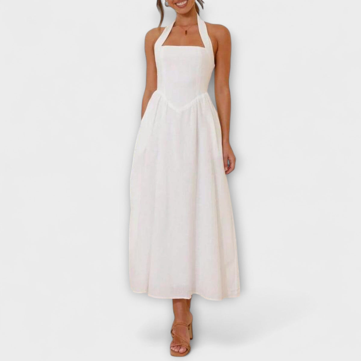 Lydia - Halter jurk van halve lengte met detail in de taille